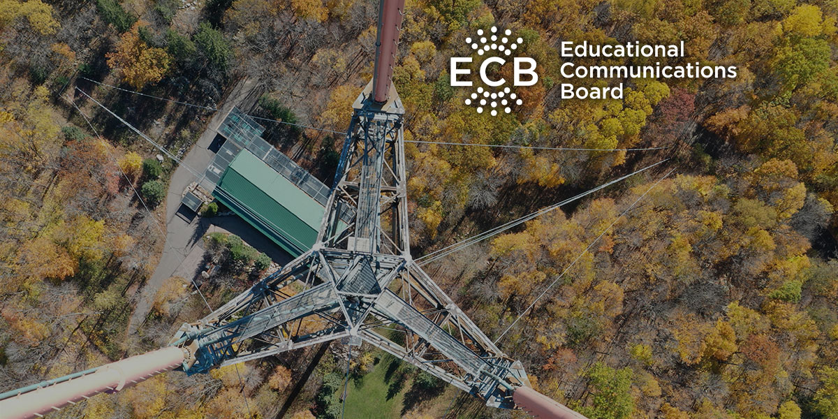 ECB logo over an aerial picture of a broadcast tower with fall trees below.